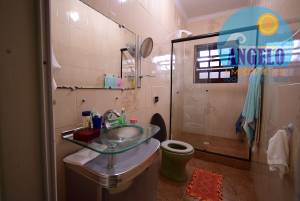 Casa com piscina para venda no bairro Oásis em Peruíbe, entre 800 e 1200 metros da praia