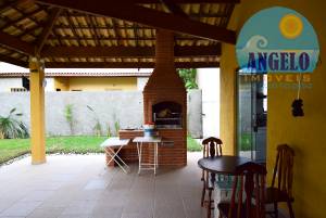 Casa com piscina para venda no bairro Oásis em Peruíbe, entre 800 e 1200 metros da praia