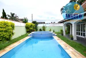 Casa com piscina para venda no bairro Jardim Marcia em Peruibe