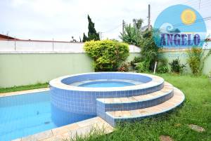 Casa com piscina para venda no bairro Jardim Marcia em Peruibe