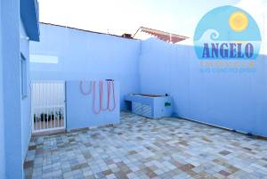Sobrado com piscina para venda no bairro Cidade Nova Peruibe, entre 800 e 1200 metros da praia