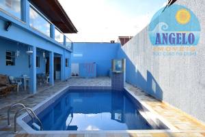 Sobrado com piscina para venda no bairro Cidade Nova Peruibe, entre 800 e 1200 metros da praia