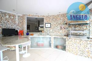Sobrado á venda no condomínio Bougainvillée I em Peruibe, frente ao mar