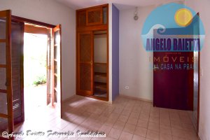 Casa com piscina, 3 dormitórios, 2 lotes, á venda no bairro Florida em Peruíbe