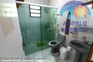 Casa com piscina para venda no bairro Centro em Peruíbe