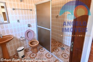 Casa com piscina á venda no bairro Oásis em Peruíbe