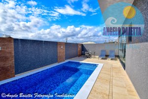 Casa com piscina, 3 suítes, á venda no condomínio Bougainvillée IV em Peruíbe