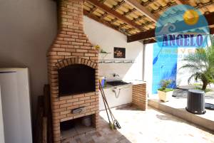 Sobrado com piscina, 4 suítes, no bairro Stella Maris em Peruibe