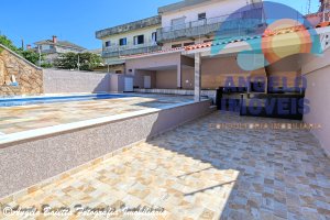 Sobrado lado praia, 4 suítes, piscina, á venda no bairro Cidade Nova Peruíbe em Peruíbe
