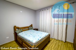 Sobrado com piscina á venda no condomínio Bougainvillée V em Peruíbe