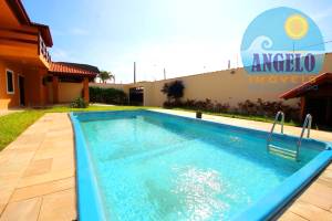 Casa com piscina, 3 lotes, no bairro Belmita Novaes em Peruibe