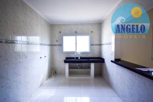 Casa com piscina á venda no bairro Stella Maris em Peruíbe