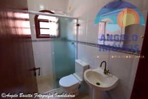 Casa lado praia á venda no bairro Turistico em Peruíbe 