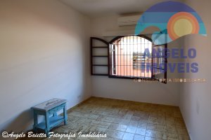Casa lado praia á venda no bairro Turistico em Peruíbe 