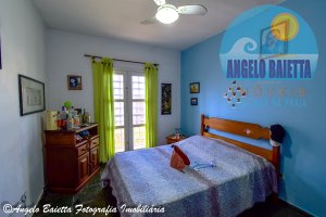 Casa com piscina á venda no bairro Stella Maris em Peruíbe