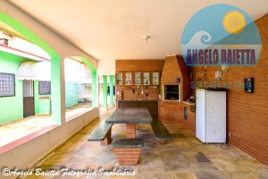 Casa com piscina á venda no bairro Stella Maris em Peruíbe