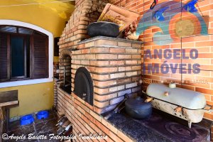 Casa com piscina á venda no bairro Jangada em Peruíbe