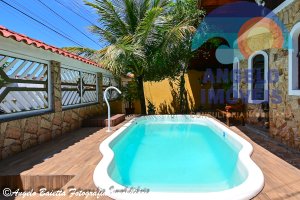Casa com piscina á venda no bairro Jangada em Peruíbe
