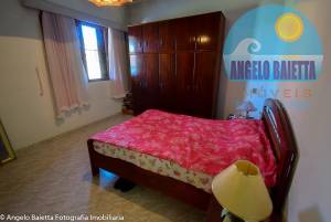 Casa com piscina á venda no bairro Costão em Peruibe