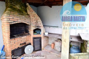 Casa com piscina á venda no bairro Cidade Nova Peruíbe em Peruíbe